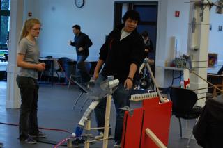 Students building a Rube Goldberg machine