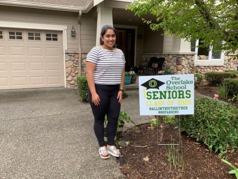 Senior with yard sign