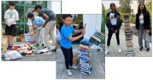 Students stacking discarded books