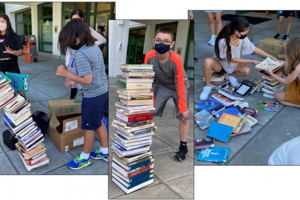 Students stacking books